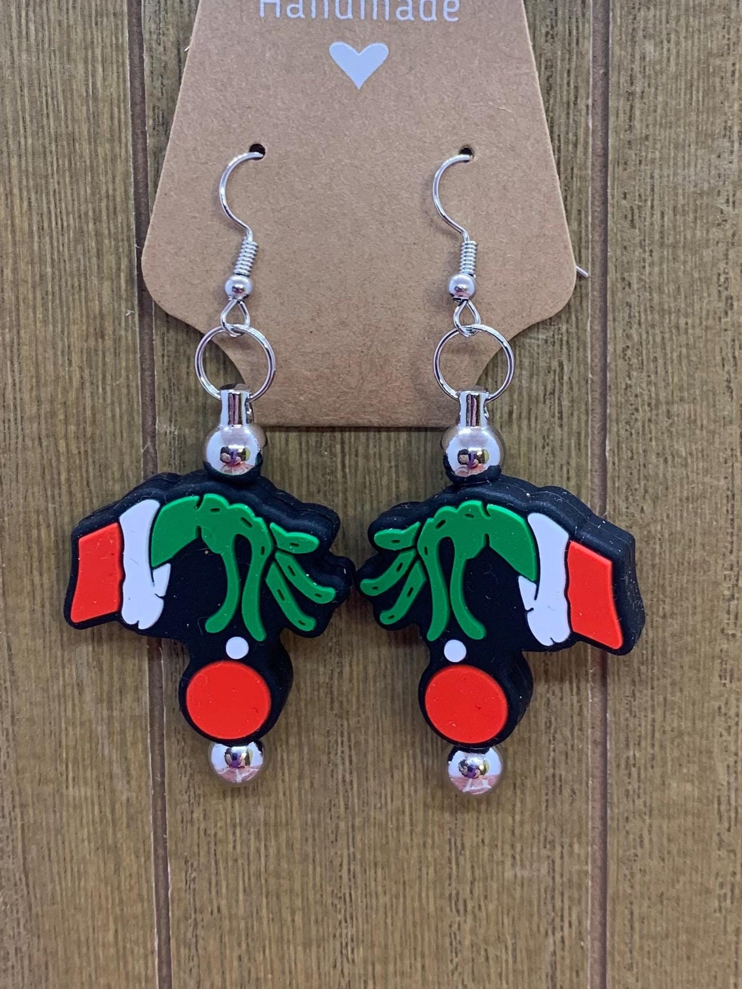 Green Mean holding ornament Earrings